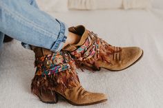 Step into Western charm with our Dreamcatcher Boot Covers, blending boho elegance and cowgirl flair. These unique accessories boast tribal-inspired designs, enhancing your footwear with a touch of Southwestern allure. Perfect for festivals or everyday fashion, these leg warmers add a stylish twist to your boots, creating a trendy and eye-catching look. Elevate your cowgirl wardrobe with these fashionable Western Dreamcatcher Boot Covers, making every step a statement. SPECIFICATIONS * Western bo Cowgirl Fashion, Boot Covers, Western Style Boots, Boot Straps, Unique Accessories, Boot Cuffs, Cow Girl, Cowgirl Style, Western Style