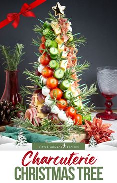 a christmas tree made out of fruits and vegetables with text overlay that reads, charcutee christmas tree