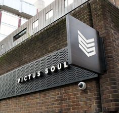 a brick building with a sign that says vicious soul on it