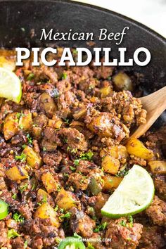 mexican beef picadillo in a skillet with lime wedges