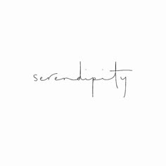 a black and white photo with the word serendity written in cursive writing