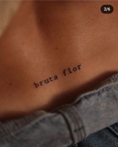 the back of a woman's stomach with an inscription on it that reads, bruta flor