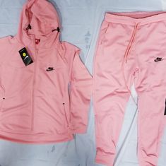 Peach Nike Zip Up Hoodie And Pants Pink Tracksuit For Leisure In Winter, Pink Athleisure Tracksuit For Winter, Pink Cotton Tracksuit For Leisure, Pink Winter Tracksuit In Athleisure Style, Pink Winter Tracksuit For Leisure, Pink Winter Athleisure Tracksuit, Pink Winter Leisure Tracksuit, Pink Tracksuit For Sports In Spring, Pink Spring Tracksuit For Sports