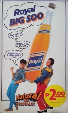 an advertisement for royal big 500 with two young men holding a giant orange soda bottle