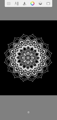 an image of a black and white flower on a cell phone with the screen open