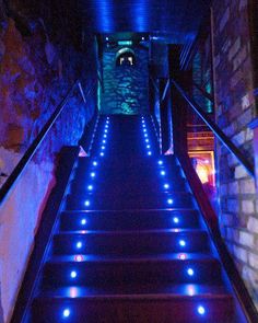 the stairs are lit up with blue leds and there is no image here to provide a caption for