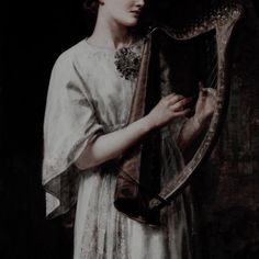 a painting of a woman holding a harp