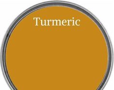 a yellow tin with the word turmric in white lettering on it and an orange background