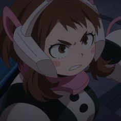 an anime character with headphones on her ears