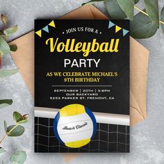 a volleyball birthday party card on top of an envelope