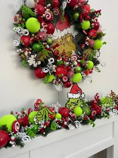 a christmas wreath is hanging on the wall