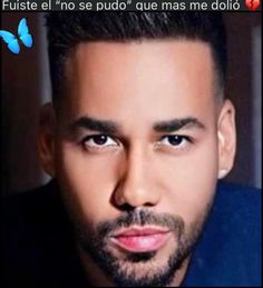 a man is looking at the camera with a blue butterfly on his chest and in front of him