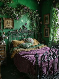 a bedroom with green walls and purple bedspread on the bed is decorated with flowers