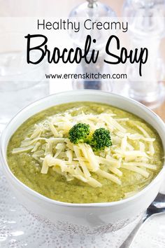 broccoli soup in a white bowl with cheese on top and the words healthy creamy broccoli soup above it