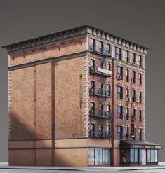 an old brick building with windows and balconies on the top floor is shown