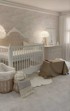 a baby's room is decorated in neutral colors