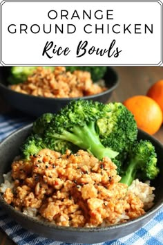 two bowls filled with rice and broccoli on top of a blue towel next to oranges