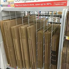 there is a sign that says congratulations sale in front of many stacks of folders