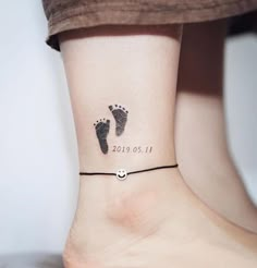 a woman's foot with a tattoo on her ankle that reads 2013 01 11