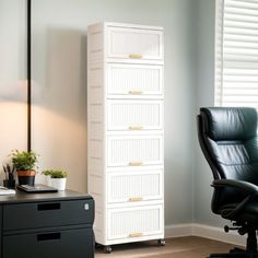 an office chair sitting in front of a tall cabinet with drawers on it's sides