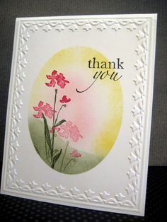 a thank card with pink flowers in the center and a white border around it that says, thank you