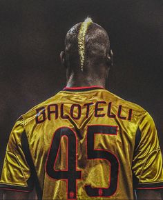 the back of a soccer player's jersey with gold thread on his head and hair