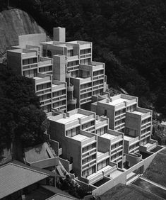 an aerial view of a building with many balconies