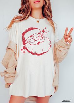 UNISEX T-SHIRT The perfect shirt for Christmas! Screen Printed. These shirts are %100 cotton.  Regular Unisex cut and true to size.  If you want to get an oversized look please size up 1-2 sizes! Santa Shirt Ideas, Relaxed Fit Crew Neck T-shirt For Christmas, White Relaxed Fit Christmas T-shirt, White Relaxed Fit T-shirt For Christmas, Pre-shrunk White Christmas Shirt, White Pre-shrunk Christmas Tops, White Cotton Christmas Shirt, Red Christmas T-shirt With Relaxed Fit, Christmas Cotton T-shirt With Screen Print