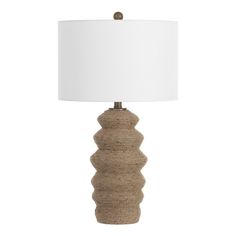 a table lamp with a white shade on it