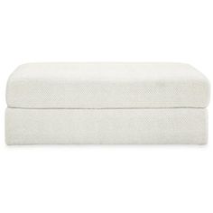 a white footstool on a white background