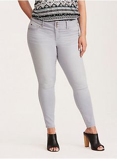 <div>What's not to love about the Jegging? It's oh-so-comfy and oh-so-flattering. A three-button higher-rise waistband holds you in, while faux front pockets create a sleek, streamlined shape. This light grey washed style sports subtle whiskering on the leg, giving it that well-loved look. A stretchy, slimming style that can be worn rolled or straight.</div><div><ul><li style="list-style-position: inside !important; list-style-type: disc !important">Higher-rise</li><li style="list-style-posi... Jeggings Plus Size, Gray Jeans Plus Size, Plus Size Jegging, Jeggings For Women, Style List, Women's Plus Size Jeans, New Street Style, Active Outfits, Grey Wash