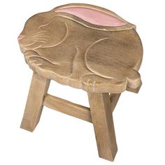 a wooden stool with an animal design painted on it's back legs and feet