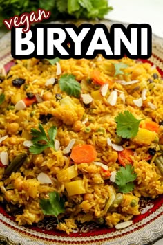 a plate full of rice and vegetables with the words vegan biryani above it