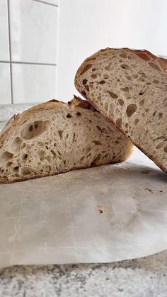 two pieces of bread sitting on top of a counter