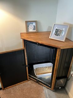 a cat bed in the corner of a room