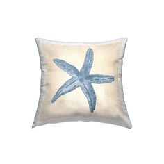 a blue starfish pillow on a white background