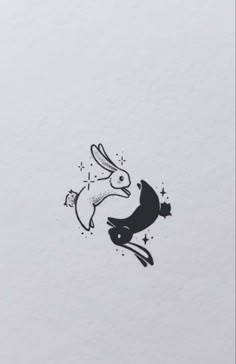 a drawing of a rabbit flying through the air with stars on it's back