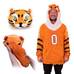 Introducing the Clemson University Snugible - the ultimate cozy companion for every true Tigers fan! Say goodbye to shivering on those chilly game nights, because this Clemson blanket hoodie has got you covered (literally). Not only does it keep you warm and toasty, but it can also transform into a plush Tigers pillow. Made with ultra soft materials, the Clemson Snugible is like being hugged by a fluffy orange cloud - or, better yet, an actual Clemson Tiger (minus the claws, of course). Clemson Blanket, Gifts For Adult Women, Hoodie Pillow, Cozy Gifts, Sweatshirt Blanket, Unique Blankets, Clemson University, Oversized Blanket, Man Quilt