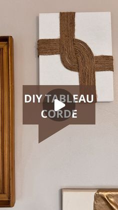 the diy tableau corde is hanging on the wall