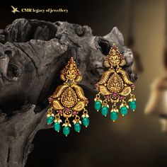 So what are you waiting for? Visit our store near you or Call/ WhatsApp/ Video Call:📱 +91-8881881193 - Shopping made easier with Cmr Legacy Of Jewellery!  Discover the enchanting allure of Nakshi earrings, where ruby potas, emerald drops, and south sea pearls come together in a symphony of colors and textures, each pair a testament to refined craftsmanship.  Experience the luxury of Our Nakshi Earrings Gold Jewellery collection - Contact us to know more!  . . . .  #Cmrlegacyofjewellery #Cmrjewellery #Cmr  #SparkleWithCmrLegacyOfJewellery  #22Karatjewellery #Nakshi #Nakshijewellery #Nakshiearrings #Earring #Earrings #Earringscollection #Homeconvenience #Videocalltoshop #Freeshipping #Livevideoshopping #Onlineshopping Nakshi Jhumkas, Latest Necklace Design, Gold Earrings For Kids, Black Beads Mangalsutra Design, New Gold Jewellery Designs, Antique Necklaces Design, Gold Earrings Models, Bridal Jewelery