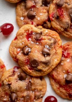 chocolate chip cookies with cherries on top