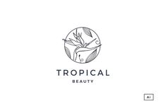 the logo for tropical beauty, which is designed in black and white with a bird on it