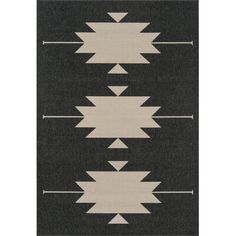 a black and white rug with arrows on it