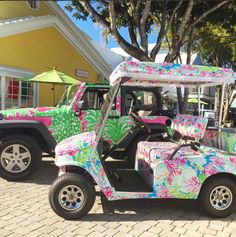 an image of two colorful jeeps parked in front of a beachfront restaurant on facebook