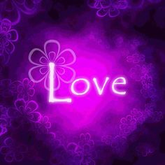 the word love written in neon lights against a dark background with flowers and swirls