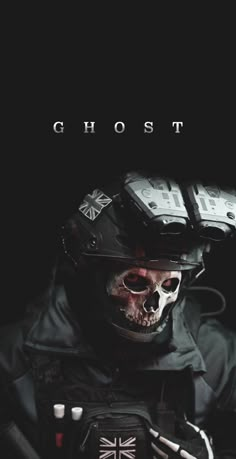 a man wearing a helmet with skulls on it's face and the words ghost written above him