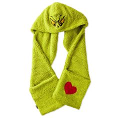 You'll be wearing a Grinchy grin whenever you enjoy winter activities in this handy hooded scarf. Cozy green scarf features a Grinch face embroidered on the hood and includes two large pockets on the ends of the scarf for warming your hands or carrying necessities. A red heart-shaped appliqué on one of the two pockets adds heartwarming charm to the soft fleece scarf. It makes a fun gift for a teacher, college kid or Grinch fan. | Green Grinch hooded scarf features embroidered and appliqué accents on the hood and one pocket. | Makes a great gift for Grinch fans. | Imported. 100% polyester. | Hand wash. Do not bleach. Hang to dry. Do not iron. Do not dry clean. | 68'' L Hooded Scarf With Pockets, Scarf With Pockets, Grinch Face, The Grinch Stole Christmas, Flying Ace, Enjoy Winter, Fleece Scarf, College Kids, Grinch Stole Christmas