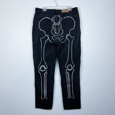 "Looking for a unique and edgy addition to your wardrobe? Look no further than these rhinestone skeleton jeans! Featuring a stunning design that combines the boldness of a skeleton with the sparkle of rhinestones, these jeans are sure to turn heads and make a statement. Crafted with high-quality denim and embellished with shimmering rhinestones, these jeans are both durable and stylish. The skeleton design adds a touch of rock 'n' roll to any outfit, whether you're dressing up for a concert or s Halloween Jeans, Skeleton Jeans, Rhinestone Skeleton, Rhinestone Skull, Rhinestone Jeans, Upcycle Clothes Diy, Skeleton Design, The Skeleton, A Skeleton