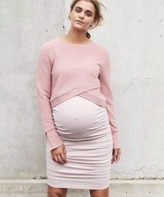 Features This pink maternity skirt is made in our super-stretchy, super-luxe jersey so it will keep you feeling and looking great (!) With side gathers, it has lots of room for a growing bump. It has been cleverly cut so that it sits over the bump for maternity but can be worn on the wait pre/post babe too. In a beautifully neutral shade of dusty pink, it looks great with sandals or boots for a dressy vibe but we love it paired with a tee and sneaks for everyday too. We have selected a super-str Maternity Full Skirt, Maternity Clothes Skirts, Dressy Maternity Tops To Go With Skirts, Knee High Boots Skirt Maternity, Maternity Crop Top Sweater, Maternity High Skirt, Maternity Jersey Skirt, Maternity Clothes Staples, Cute Maternity Tops