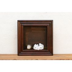 These handcrafted shadow boxes, made from solid acacia wood, make a striking statement in any contemporary setting. Their clean lines and warm wood tones create a minimalist aesthetic, while their substantial weight lends a sense of presence. Perfect for showcasing curated collections, small sculptures, botanicals, books, or artwork, these versatile boxes offer endless display possibilities.  Due to their weight, proper mounting is essential to ensure these statement pieces are securely displayed.  **Please bear in mind that colors of products shown may vary slightly from their original color due to monitor display settings or photography studio Shadow Box Shelf, Shadow Box Shelves, Shadow Box Wall, Box Shelf, Warm Wood Tones, Studio Photography Lighting, Box Shelves, Box Wall, Small Sculptures